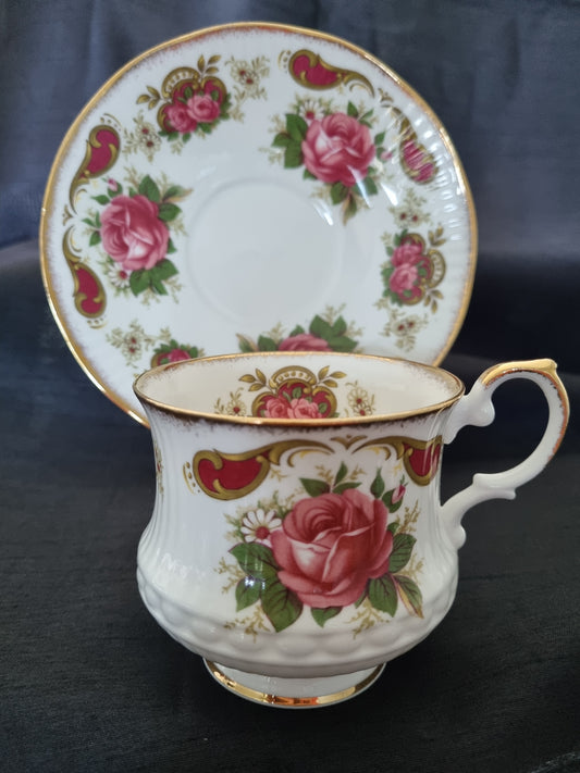 Queens Vintage Tea Cup and Saucer with gold trim and red rose